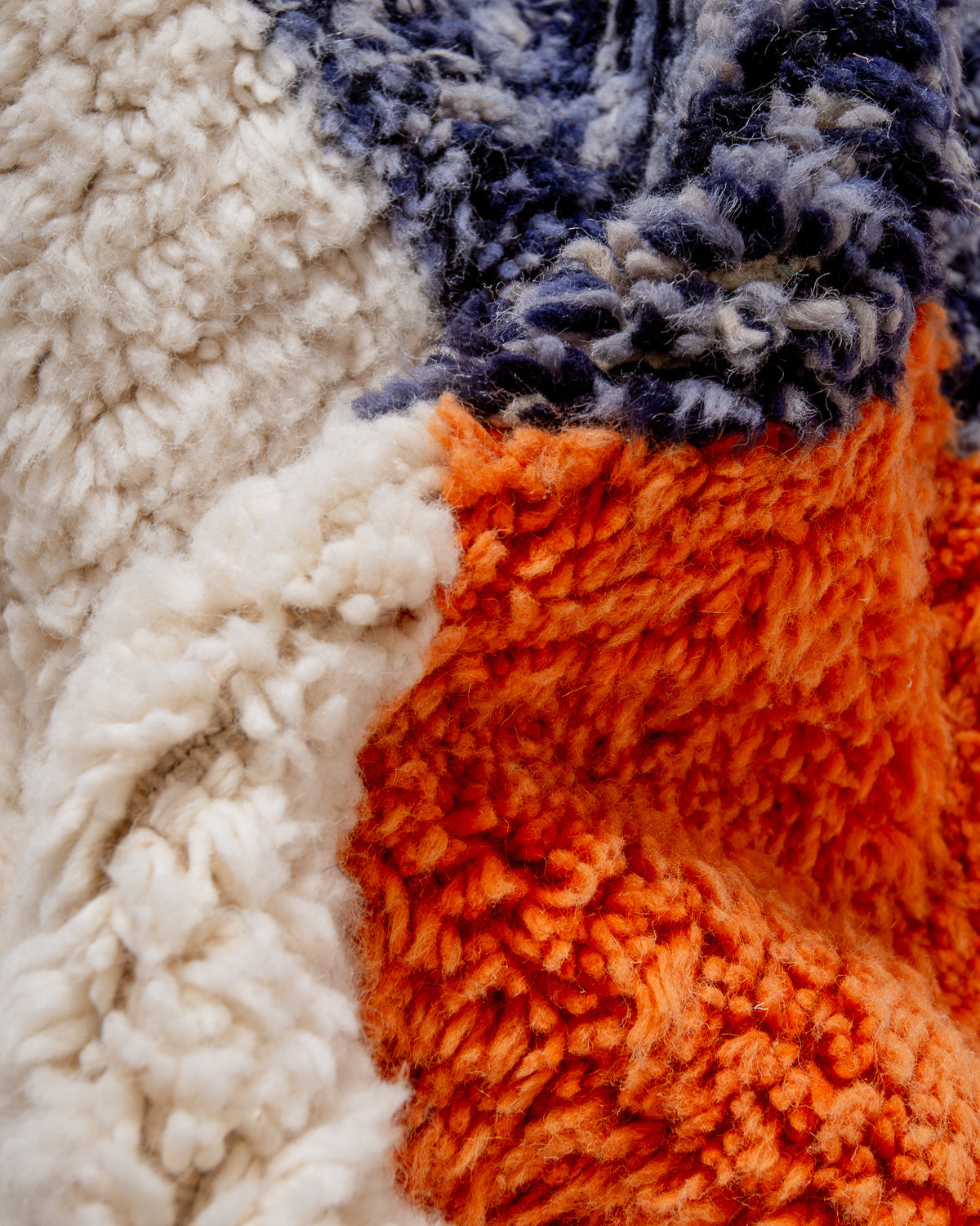 Modern, designer, handcrafted Berber rug from Morocco. Beniourain carpet with beautiful colours and patterns and fluffy wool texture.